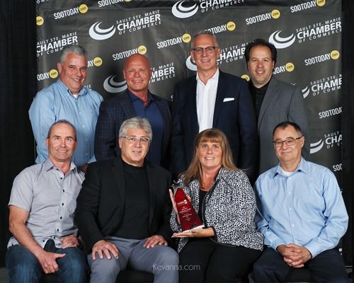 McDougall Energy team members with award