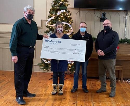 McDougall Energy Team Presents Cheque to SFCSC Executive Director, David Townsend