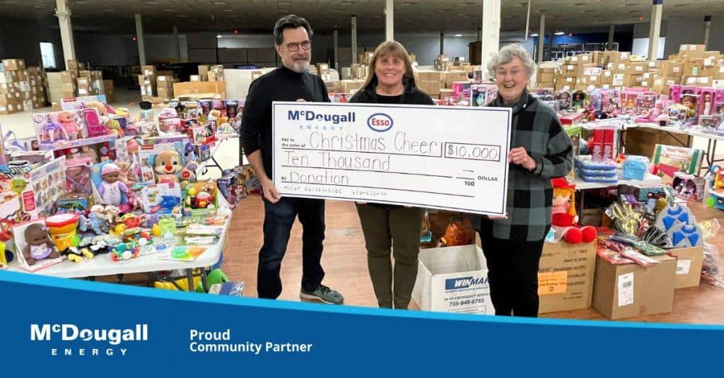 Cheque presentation with McDougall Energy and Christmas Cheer Staff