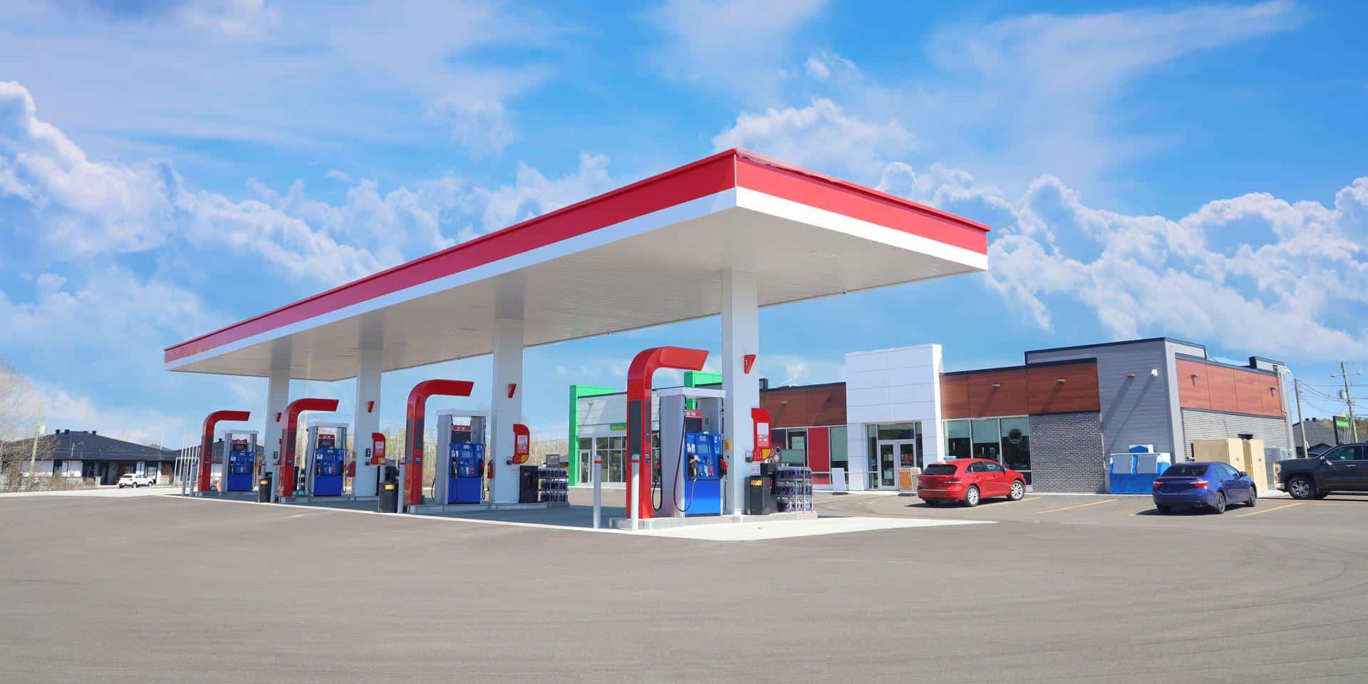 Home 3 Modern Service Station with convenience store and a few cars, in a Sunny Day